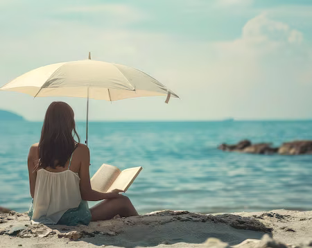 reading under umbrella